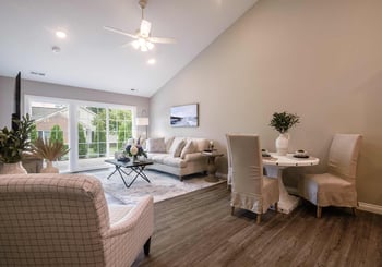 The Herrington open-concept living room at Dudley Square