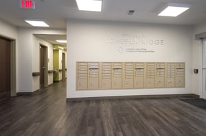 Entry way with view of mailboxes at Scheper Ridge affordable senior living community
