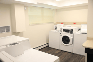 Laundry Room at Madison Villa, affordable Senior Apartments in Cincinnati