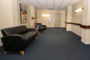 Community Area with sofas at St. Pius Place in Cincinnati